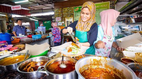 The cooking style originated from the southern part of india, but had since been localized to a malaysian taste. Street Food Malaysia - NASI KERABU + Malay Food Tour in ...