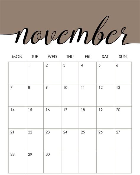 A November Calendar With The Word November Written In Cursive Writing