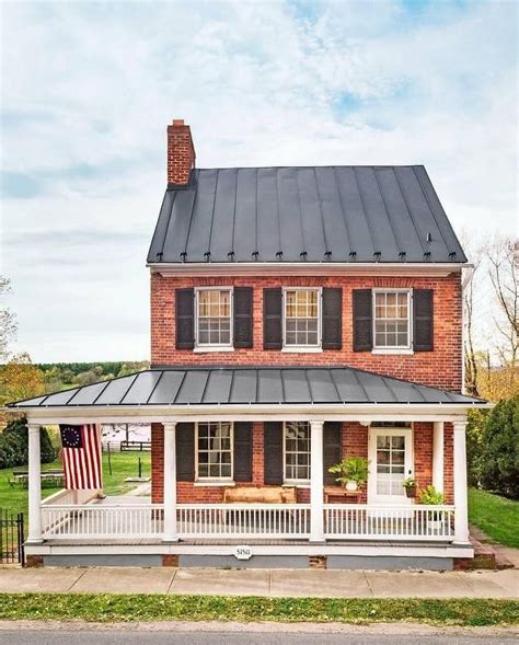 Traditional 2 Story Red Brick Metal Roof Colonial House Brick