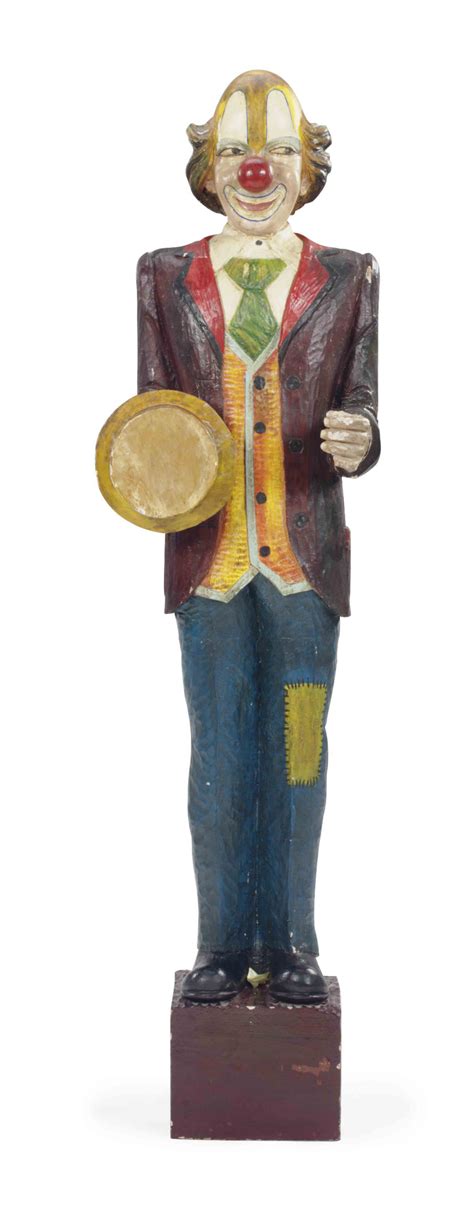 An American Carved Wood And Polychrome Painted Figure Of A Circus Clown