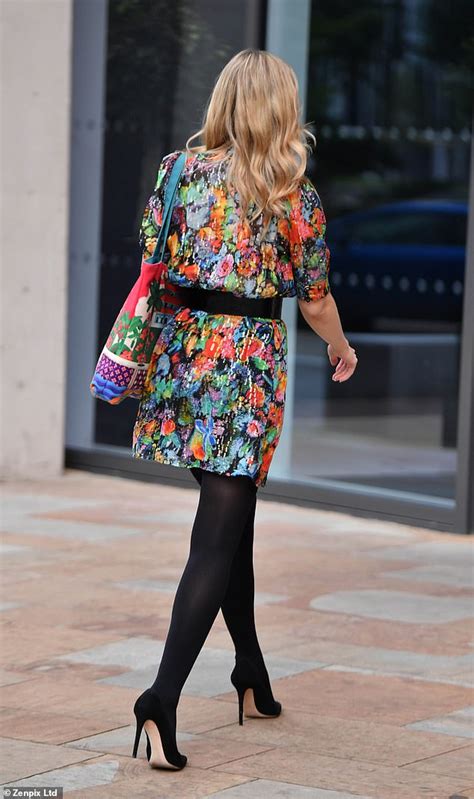 Rachel Riley Nails Casual Chic In A Floral Minidress And Black Heels As