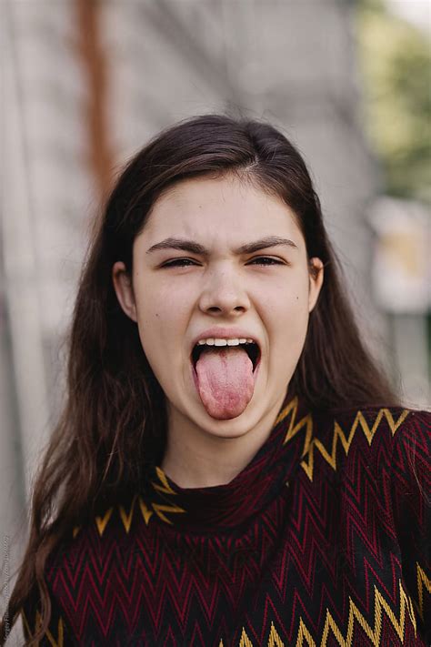 Pretty Girl Showing Tongue By Stocksy Contributor Sergey Filimonov
