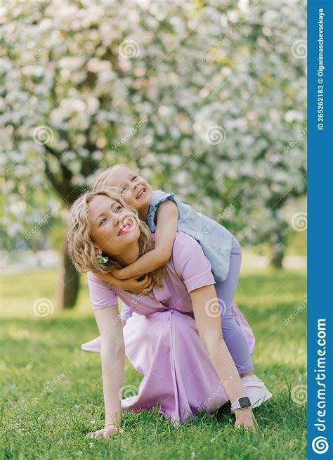 Mom And Daughter Have Fun In The Summer Outdoors In The Park Stock Image Image Of Love