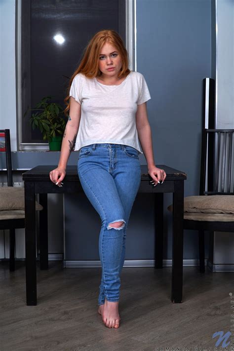 Hot Redhead Samanta Simpson Peels Off Ripped Jeans On Her Way To Posing