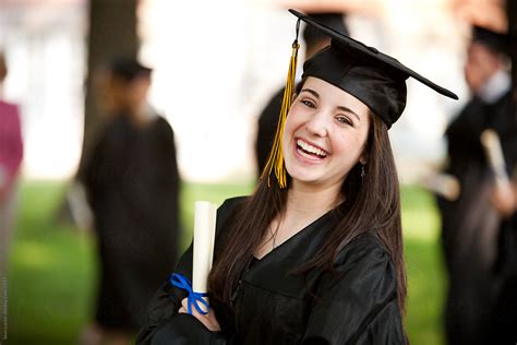 Graduation Pretty Smiling High School Graduate By Stocksy