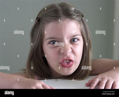 A Cute Little Girl Making A Funny Face Like She S Disgusted Stock Photo