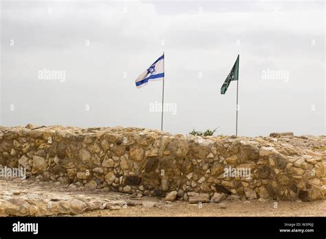 An Sraeli Flag Aloft At The Top Of The Famous Tel Megiddo