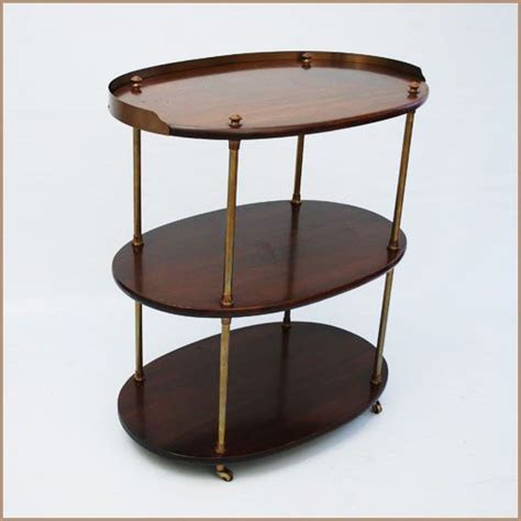 Photo courtesy matt & patti ribarich. Vintage Mahogany etagere with brass casters. | Coffee ...