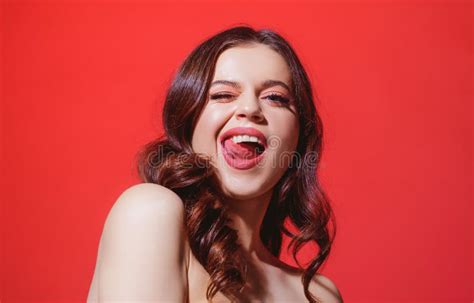 Beauty Woman Face Portrait In Studio Beautiful Girl Tongue Licking