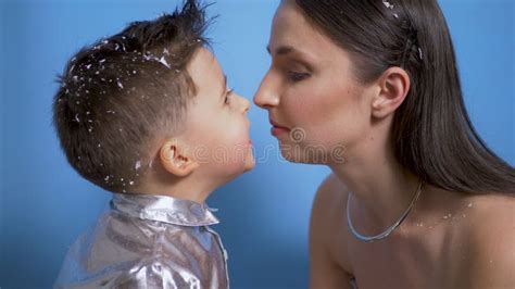 Mom In Silver Dress Kisses Son In Studio Stock Footage Video Of Kisses Human