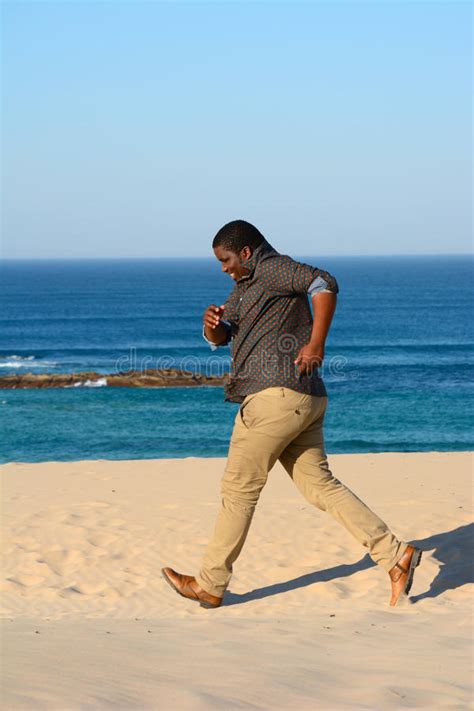 Black Man Jogging On Beach Stock Photo Image Of Activity 32738316