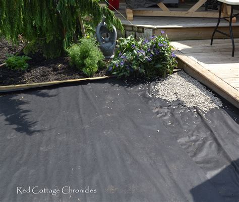 Pea gravel patios are a snap to keep clean! Backyard Makeover - Pea Gravel Patio - Red Cottage Chronicles