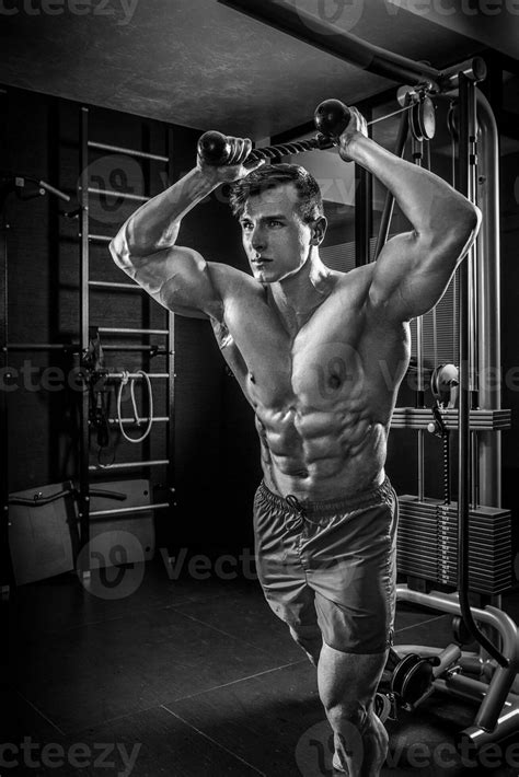 Sexy Muscular Man Posing In Gym Shaped Abdominal Strong Male N Stock Photo At Vecteezy