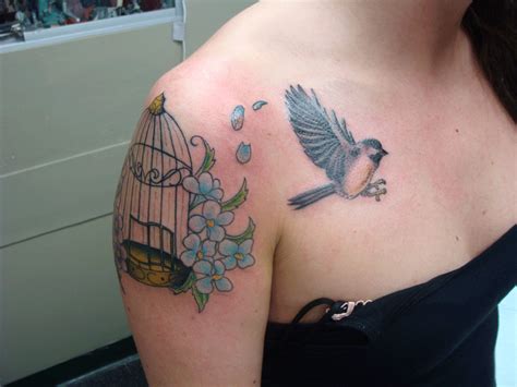 Cage Flowers And Bird Tattoo For Girls