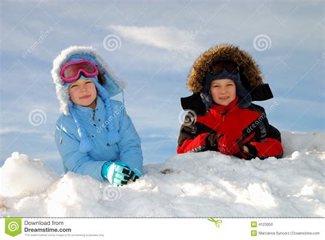Children Playing In Snow Stock Photo Image 4123050