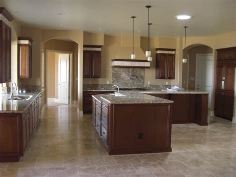 Ceramic tile is one of the safest kitchen flooring options. Kitchen-Granite slab counters, cherry cabinets, travertine ...