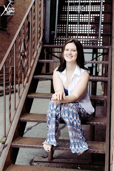 Senior Girl Pose On Stairs With Decorated Pants Barefoot