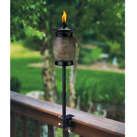 Burning tiki torches at outside family dinner to keep mosquitos away + s'mores. 64" TIKI TORCH Resin Jar 2 Pack Outdoor Backyard Garden ...