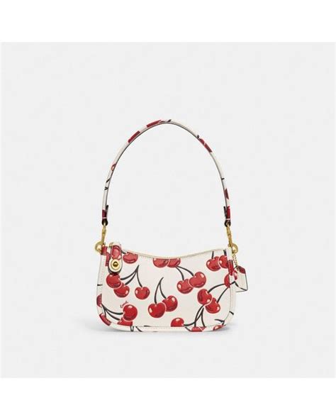 Coach Swinger 20 With Cherry Print In Red Lyst