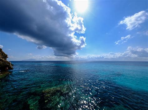 Desktop wallpaper blue sea, clouds, sunny day, hd image, picture