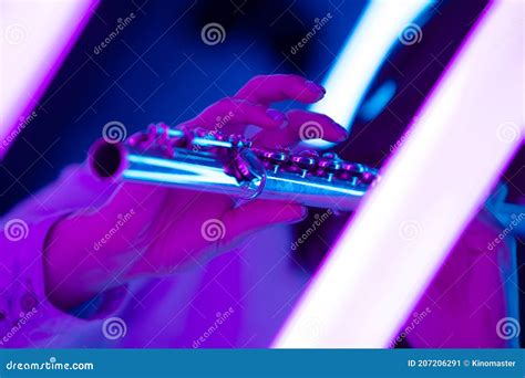 Flute In Female Hands Fingers Touch Flute Keys Close Up Stock Image
