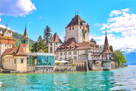 Spiez And Oberhofen Castles Are Two Medieval Keeps By Lake Thun In