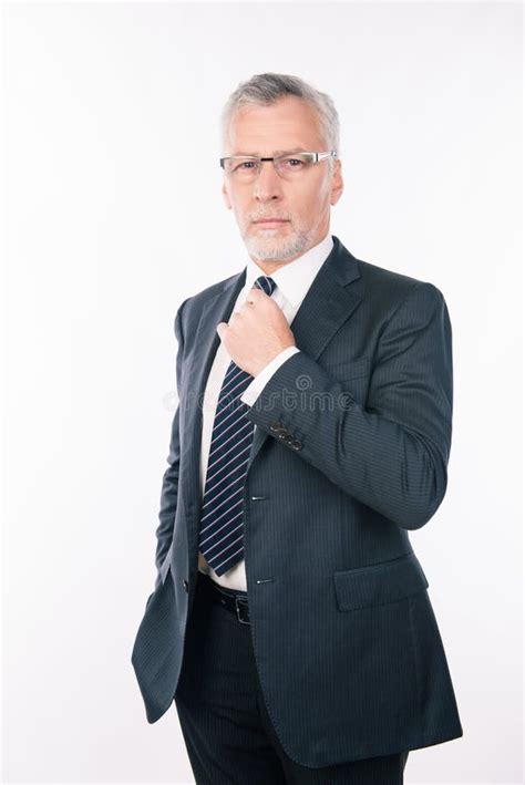 Handsome Old Businessman In A Business Suit With Glasses Stock Photo