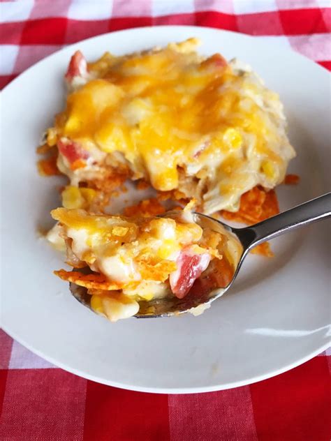 A creamy chicken dinner bake, this cheesy chicken doritos casserole is always a hit. Doritos Chicken Casserole | The Gingham Apron