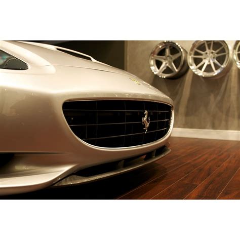 It's cheaper than any other car which ferrari currently makes. Ferrari California - DMC Carbon Fiber Front Spoiler