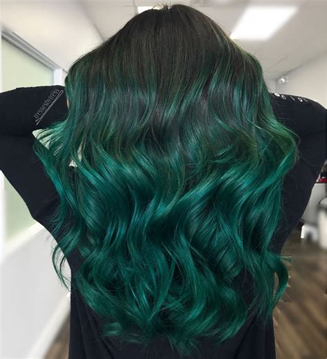 Opt for a shimmery grey hue to really bring your hair color to life. Emerald green Balayage ombré | Dark green hair, Green hair ...