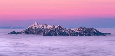 Wallpaper Id 259055 Snowcapped Mountain Peaks Above Clouds A Purple