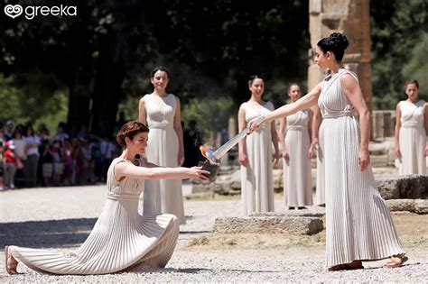 The Lighting Of The Olympic Flame In Olympia Greece Greeka