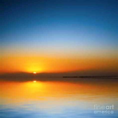 Beautiful Sunset Over Water Photograph By Colin And Linda Mckie
