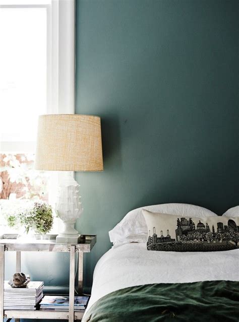 In this living room, sage walls enhance the cool color palette without taking attention away from the elegant fireplace. Modern bedroom with sage green walls | Green bedroom walls ...