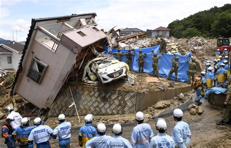 Western Japan floods: Photos of the floods that have killed at least 114 — Quartz