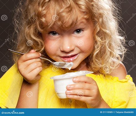 Little Girl Eating Yogurt Royalty Free Stock Photo Image 21110585
