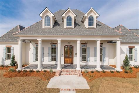 This acadian style house plan features an open layout with a formal dining and triple split floorplan. Madden Home Design - Acadian House Plans, French Country ...