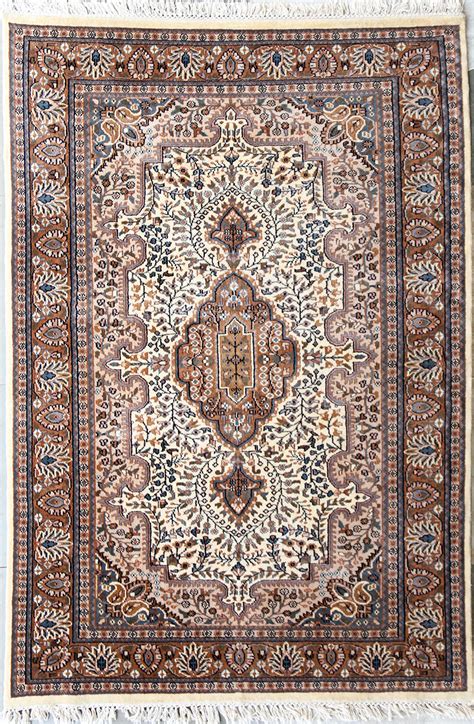 In addition, to the standard rectangular carpets and rugs, you have the option of customized coffee table rug. Hand Knotted Coffee Table Rug With Floral Design Size 7 by 5