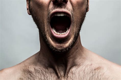 Close Up Portrait Of A Man Shouting Mouth Wide Open Stock Photo