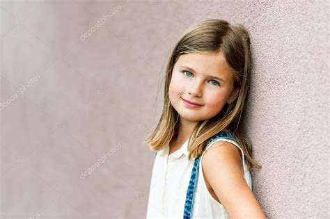 Close Up Portrait Of A Cute Little Girl Of 7 8 Years Old Leaning To