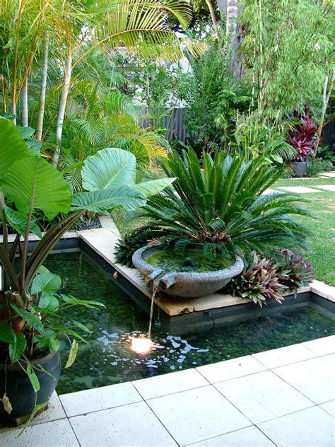 Homeowners often spend the majority of their time (and budget) decorating the inside of their home, but the front and back yards are huge areas of opportunity as well. Nedlands Tropical Garden - Cultivart Landscape Design
