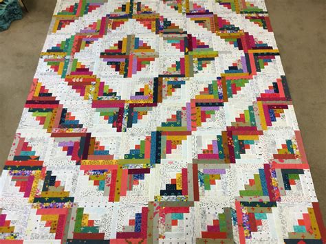 Check out our log cabin quilt designs selection for the very best in unique or custom, handmade pieces from our shops. Log Cabin Quilt - Free Bird Quilting Designs