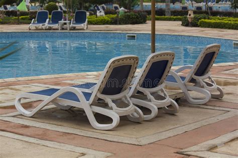 Alibaba.com offers 11,232 swimming pool chair products. Swimming Pool Lounge Chairs Stock Photo - Image: 27923040