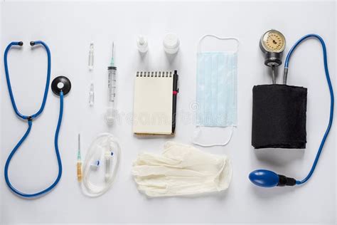 Various Medical Equipment And Notepad On White Background Stock Image