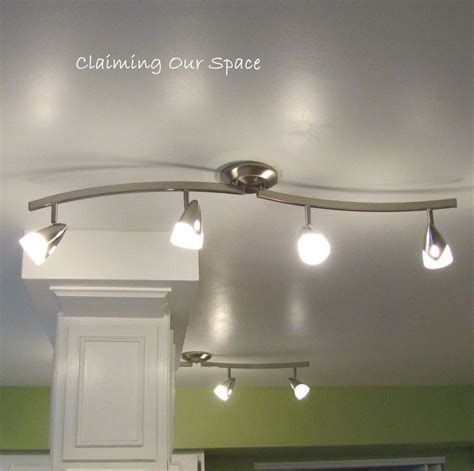 Specifically, the most common track lighting systems are those using spotlights or lamps mounted on tracks recessed in the ceiling: Kitchen Kitchen Track Lighting Vaulted Ceiling ...