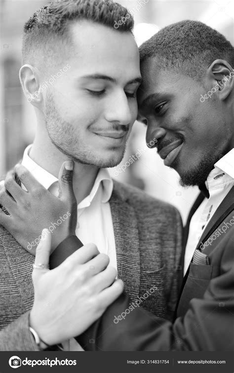 Black And White Portrait Of Afro American Gay Hugging Caucasian Boy Stock Photo By Sisterspro
