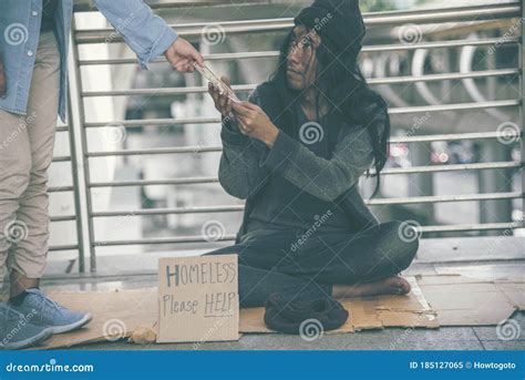 Woman Helping Hands To Homeless People Poverty Beggar Man Holding Hands