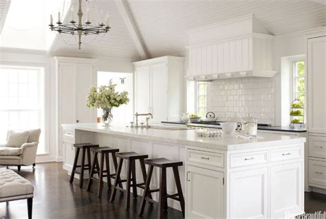 Adding bright white paint to your kitchen cabinets can transform and brighten the entire room, without breaking the bank. White Kitchen Decorating Ideas - Mick de Giulio Kitchen Design