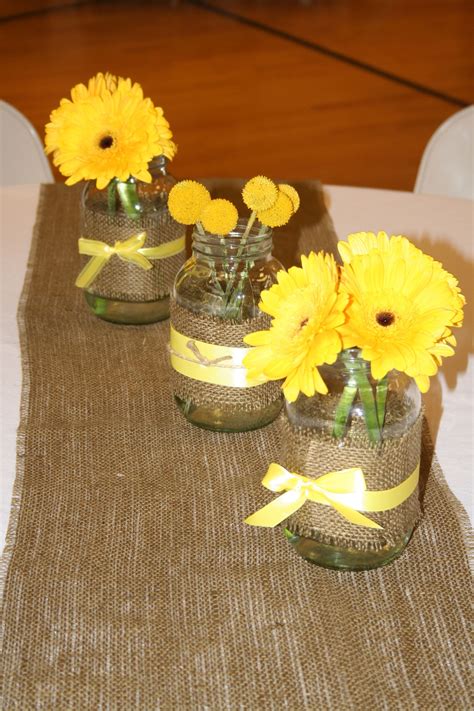 Centerpieces Of 3 Mason Jars Wrapped With Burlap And Ribbon Gerbera