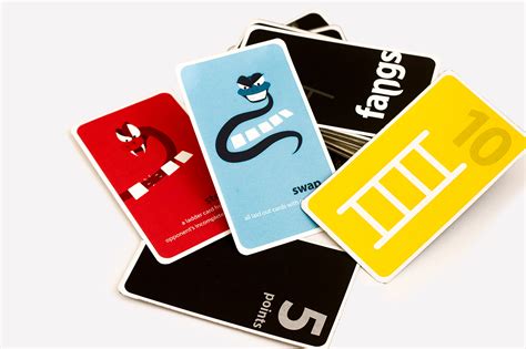 We created their brand identity, playing card design, type design, gameplay icon systems, packaging design, gameplay. Fangs // Card Game Design on Behance